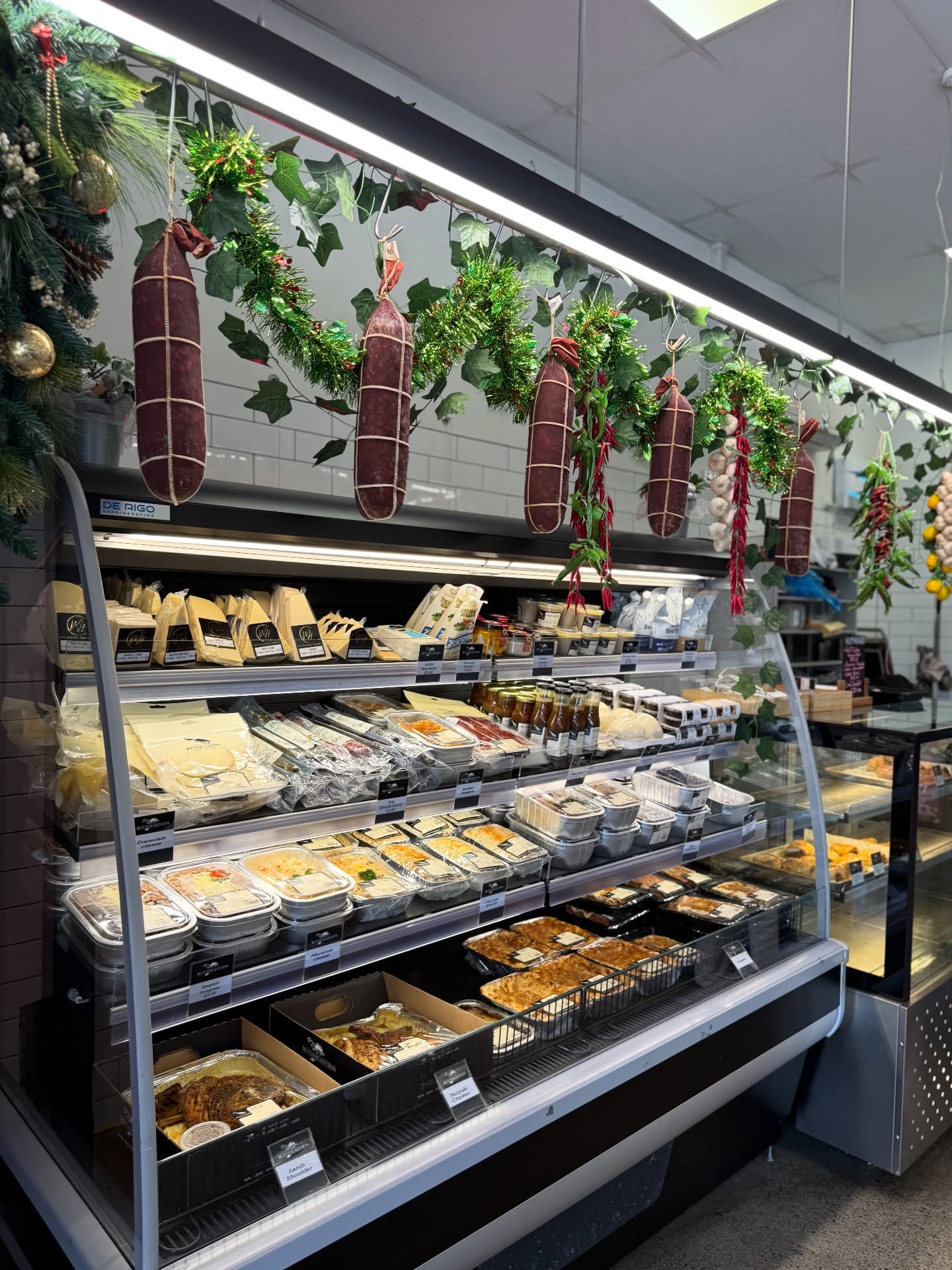 The Butchers Kitchen display case with prepared meals and products