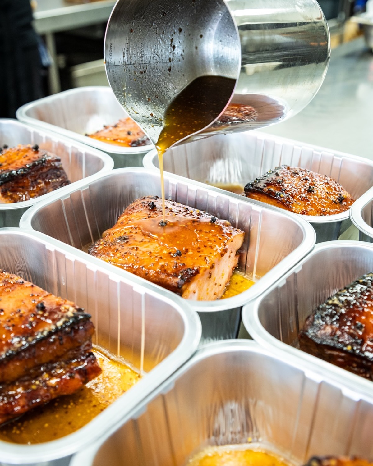 Freshly prepared vegetable dishes in foil containers